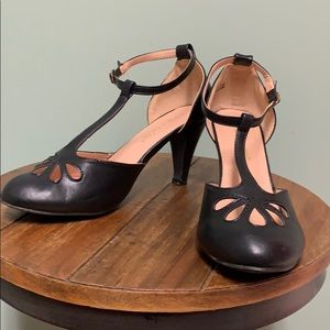 Black strapped low heels